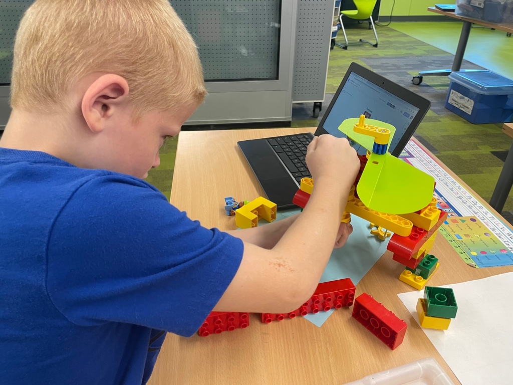 Student building Legos